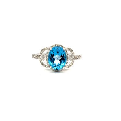 9K White Gold Ring Blue Topaz 1.98 Carat and Diamonds TDW 0.34 Carat