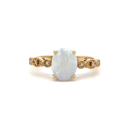 10K Yellow Gold Ring Oval shaped Australian Opal 1.04 Carat, 6 Round White Diamonds TDW 0.04 Carat