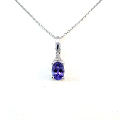 10K White Gold Pendant with Oval Tanzanite 0.86 Carat and 6 Round White Diamonds TDW 0.02 Carat